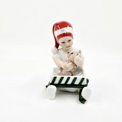 Royal Copenhagen Figur Pige bner Julegave nr. 098. sortering 1
