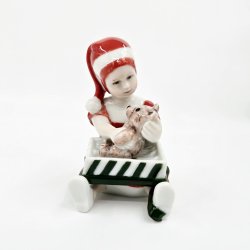 Royal Copenhagen Figur Pige bner Julegave nr. 097. sortering 1
