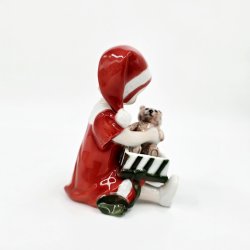 Royal Copenhagen Figur Pige bner Julegave nr. 097. sortering 1