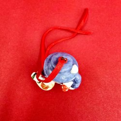 Royal Copenhagen Juleornament Pige Med Gaver Figuer nr. 155. 1 Sortering 