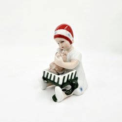 Royal Copenhagen Figur Pige bner Julegave nr. 098. sortering 1