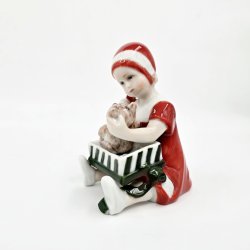 Royal Copenhagen Figur Pige bner Julegave nr. 097. sortering 1