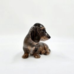 Royal Copenhagen Siddende Gravhund nr. 3140. sortering 1 